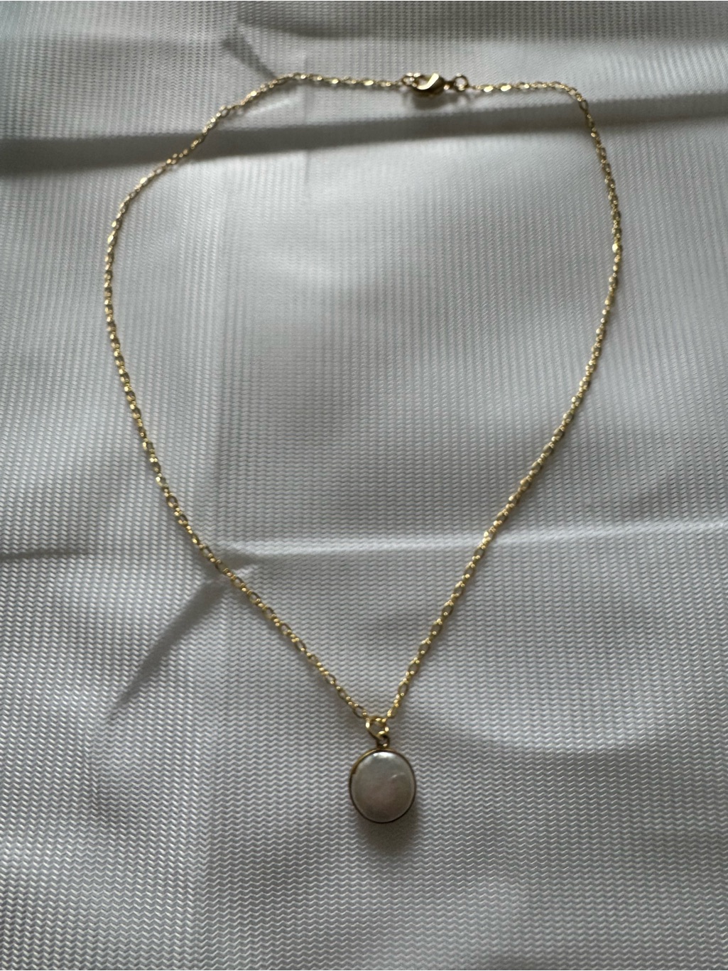 Freshwater coin pearl necklace photographed for a marketplace product listing